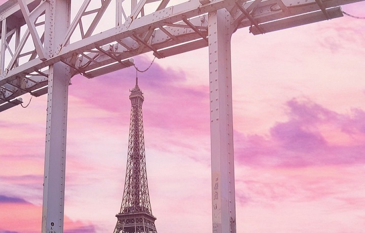 The bridge of love with the view to Eiffel Tower