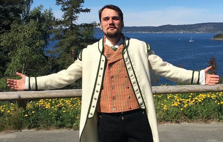 The groom wears a handmade wool suit known as bunad