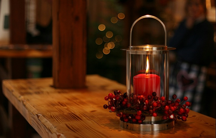 Christmas candle on the table.