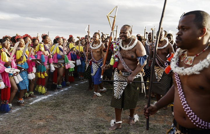 The king is carefully examining all the girls
