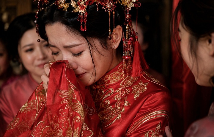 Among the Tujia ethnic group in China, one of the most important wedding traditions is the bride's crying.