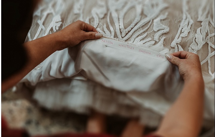It is expected that the bride will write the names of her single friends into the hem.