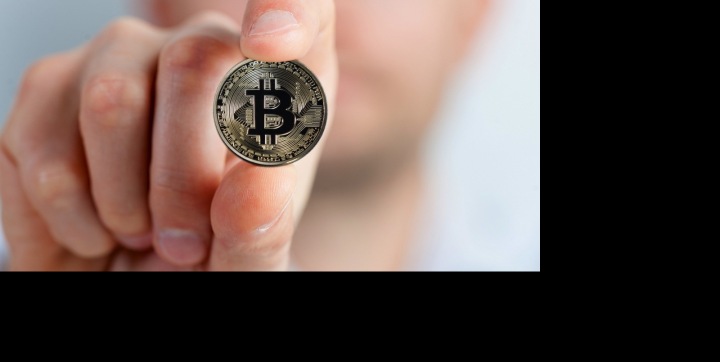 Mince Bitcoin v ruce