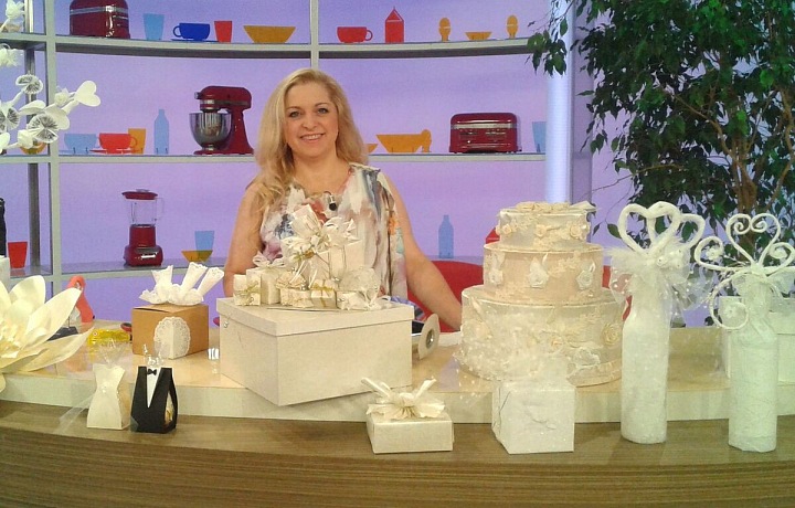 Mrs. Křivánková also wraps gifts on television.